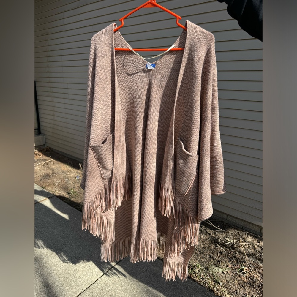 Womens poncho style sweater with pockets